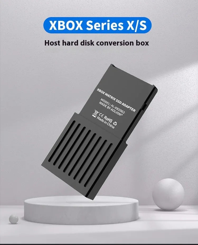 Aluminium Xbox Series X and S host hard disk switching box with CFexpress interface, screwdriver, and manual.