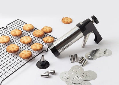 Stainless steel biscuit press with 13 moulds and 8 nozzles for baking and decorating