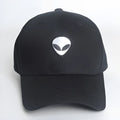 Alien head embroidered baseball cap in black with green label, cotton satin weave, side view