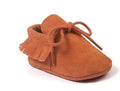Pair of baby shoes with tassel and polychromatic sanding finish in a colourful pattern on soft sole