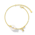 Gold-coloured women's silver bracelet with a peace buckle design and white chalcedony stone centrepiece.
