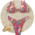 Red floral pattern women's underwire triangle bikini with briefs-style bottom on mannequin
