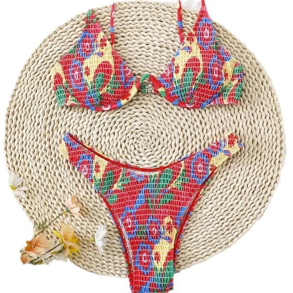 Red floral pattern women's underwire triangle bikini with briefs-style bottom on mannequin