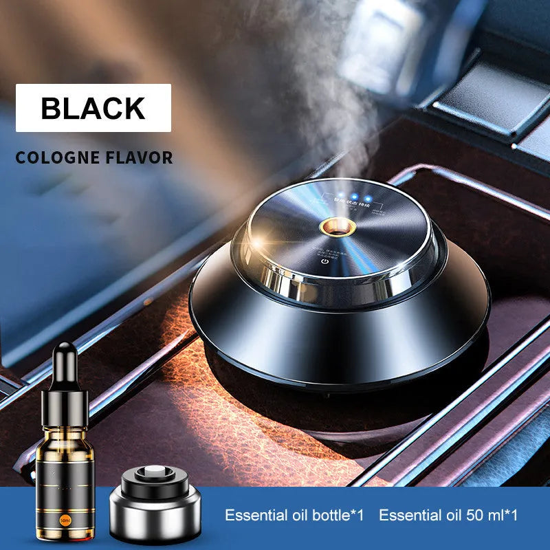 Black butterfly-shaped metal car aromatherapy diffuser with USB cable and essential oil bottle