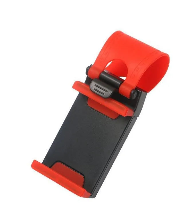 Black universal steering wheel phone holder clip mounted on a car steering wheel.