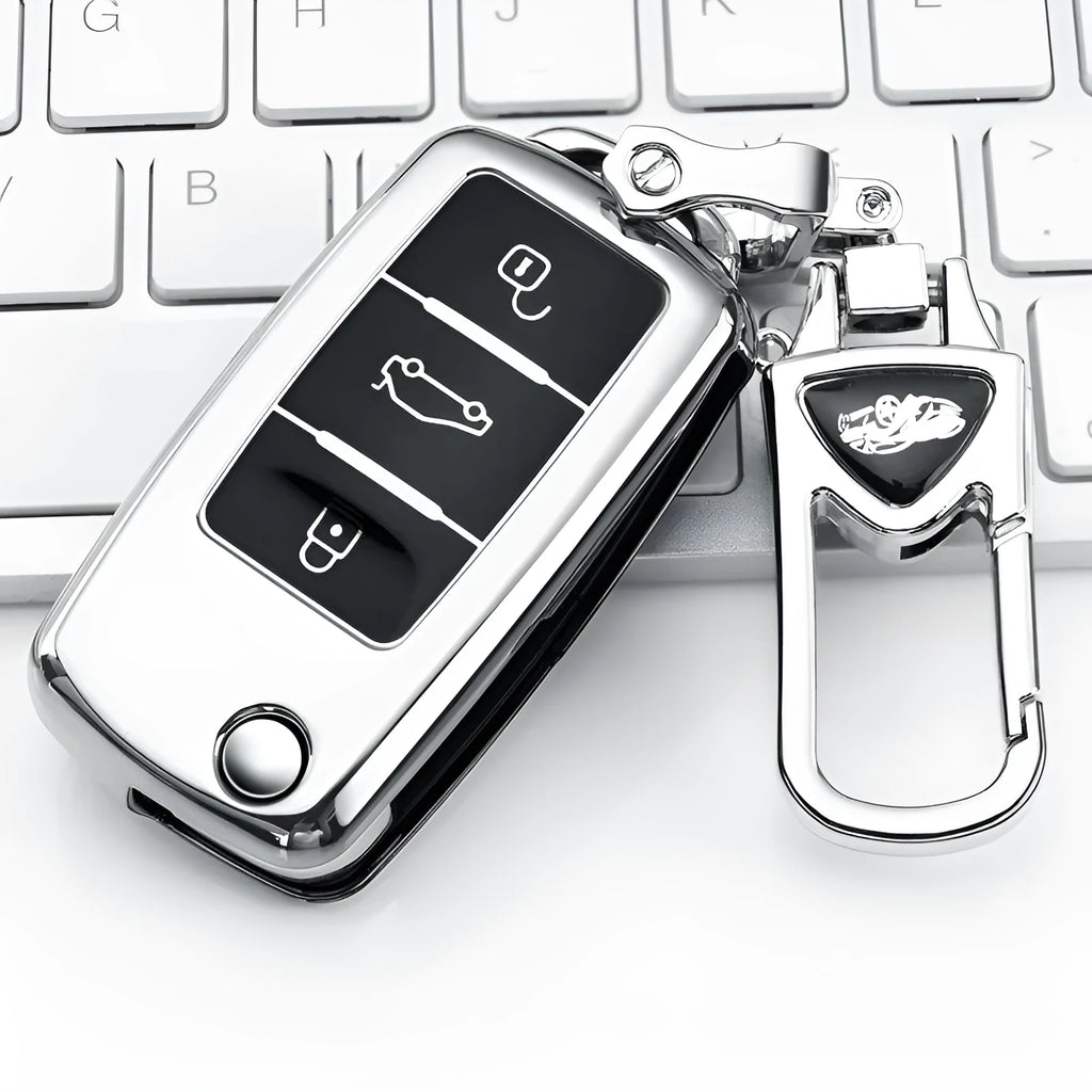 VW Model A folding key case in blue, holding three keys with a visible buckle closure.