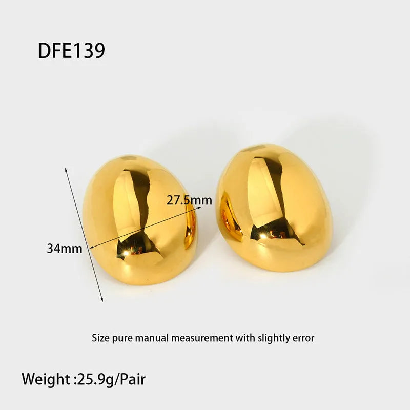 Geometric line design ear studs with stainless steel and 18K plating showing exaggerated glazed surface