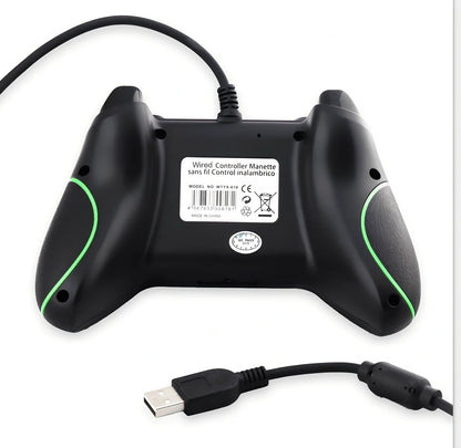 White Xbox One wired USB game controller with ergonomic grips and 2.5m cable on plain background