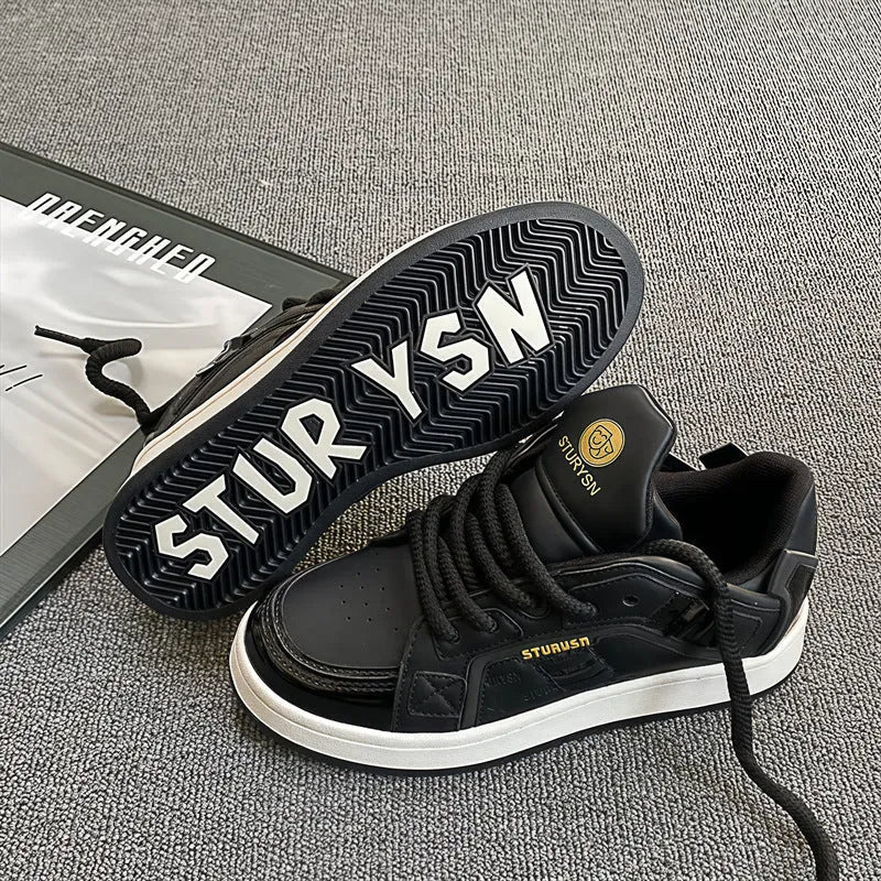 Men's black thick bottom board shoes with PU leather upper and rubber sole on a light background