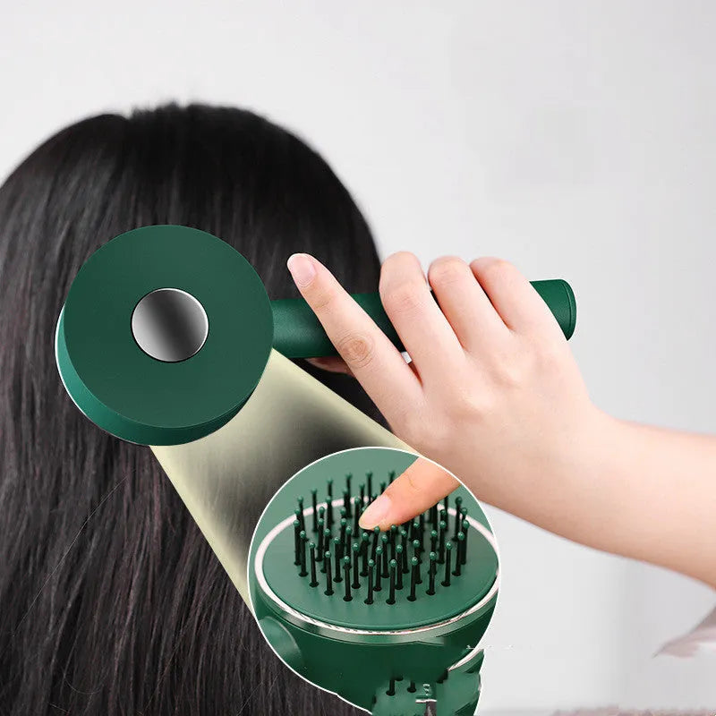 Long handle air cushion comb in green with plastic body for hair styling