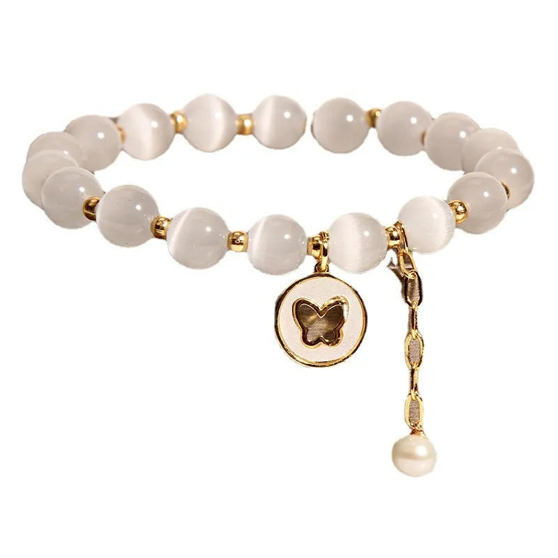 White cat's eye crystal bracelet with geometric design and Korean-style influences