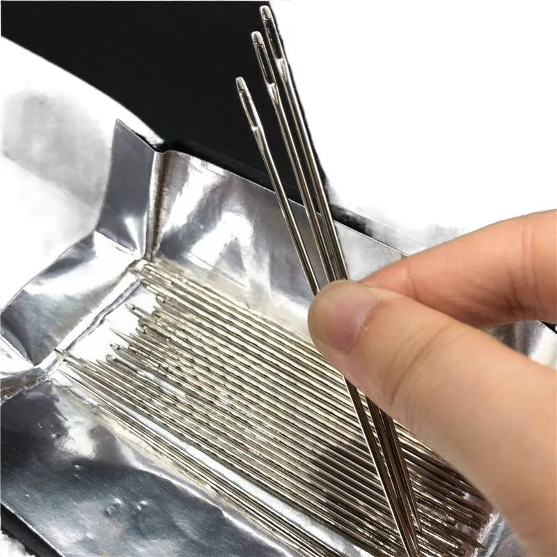 Set of five long steel sewing needles with 1.8mm body thickness and 7mm eye in a pack