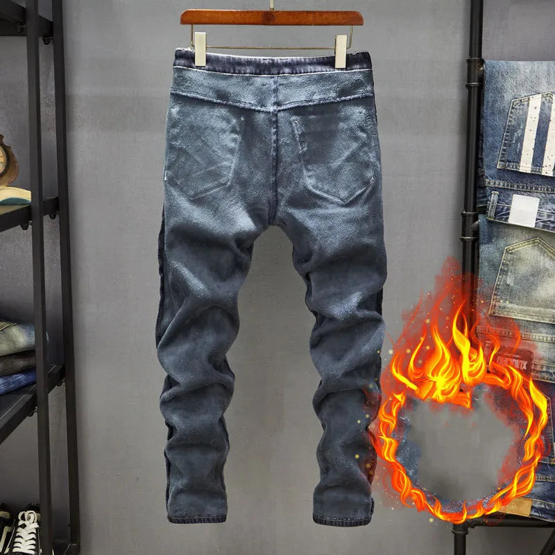 Men's slim-fit dark blue cotton denim jeans with a mid-waist and ankle-length leg.