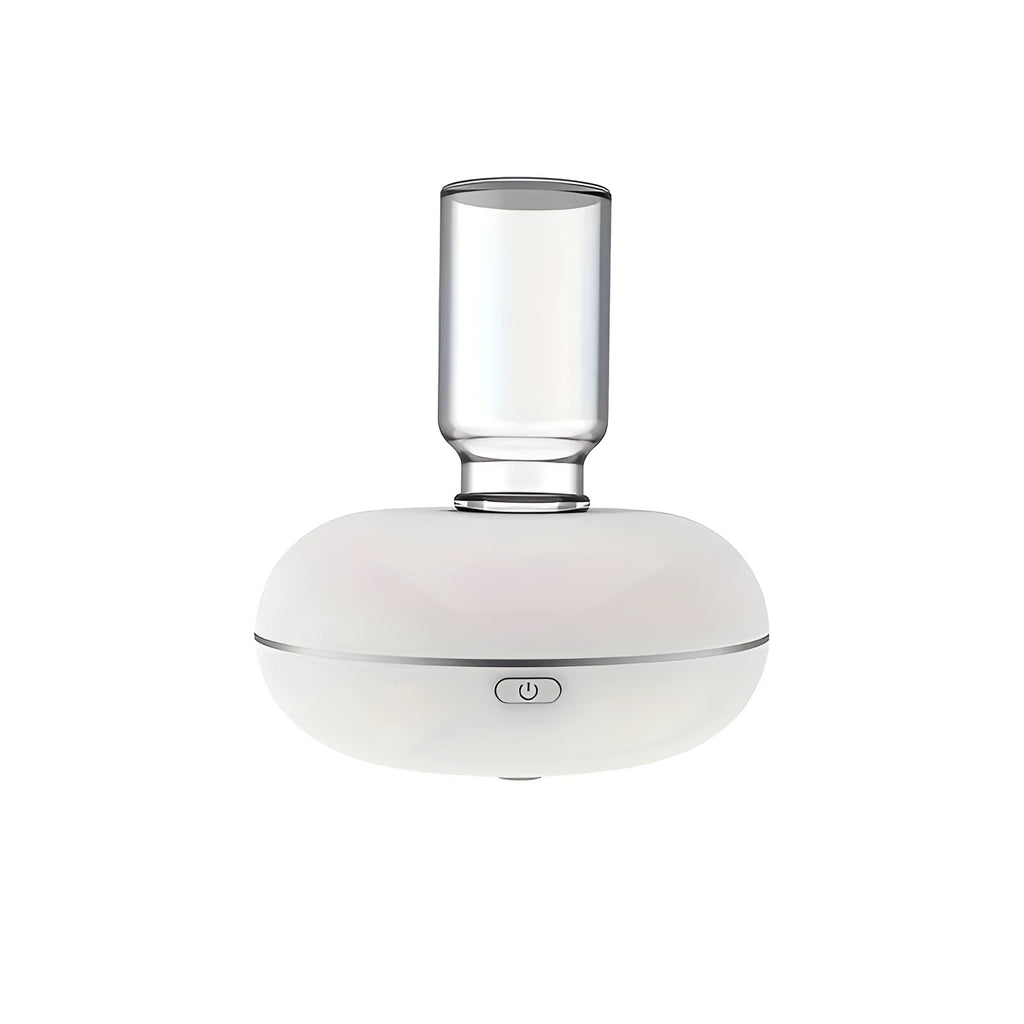 Automatic sensor fragrance machine mini USB home indoor air diffuser inverted aromatherapy in white colour on bathroom counter.