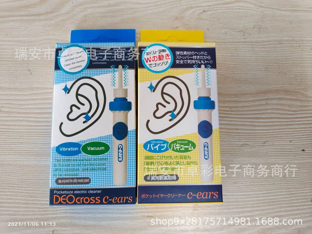 Electric ear scoop ear cleaner with silicone tips and USB charging cable on white background