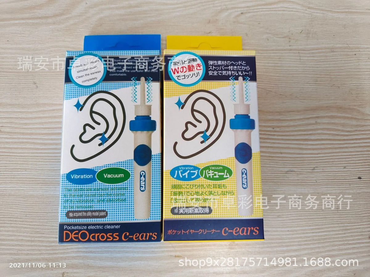 Electric ear scoop ear cleaner with silicone tips and USB charging cable on white background