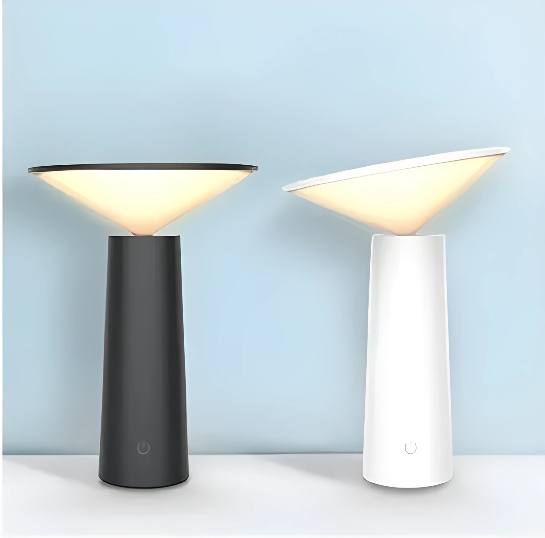 Black USB LED table lamp with touch controls and adjustable lamp head on wooden desk
