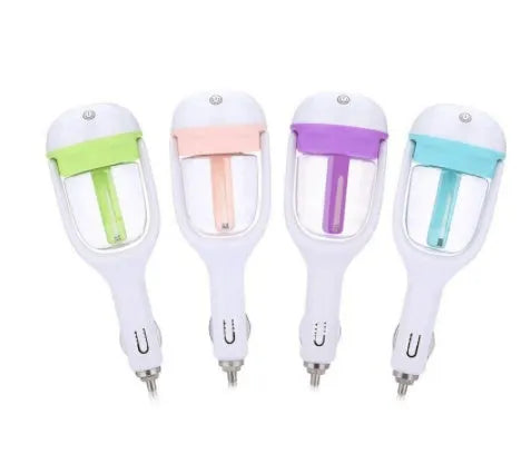 Compact portable car humidifier and air freshener unit with 180-degree rotating mist nozzle.