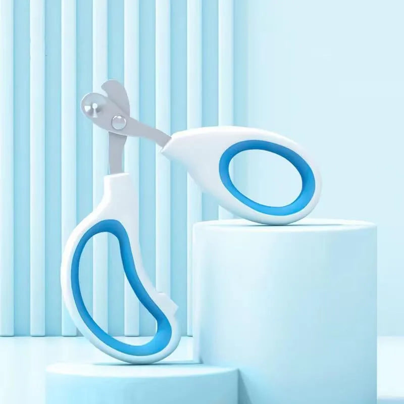 Blue pet nail clipper with circular cut hole and cushioned non-slip handle