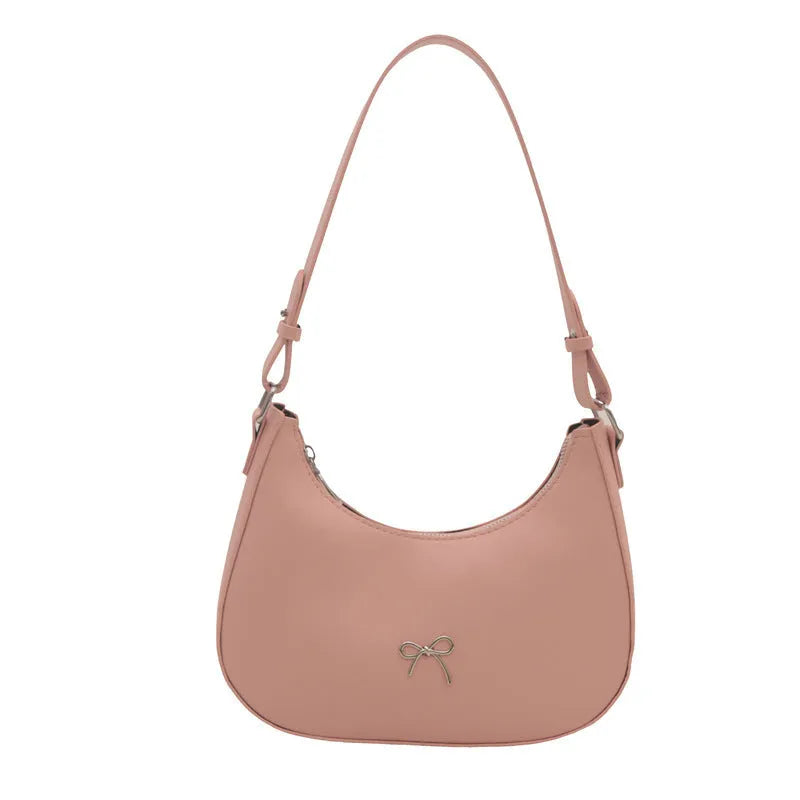 Women's dumpling-shaped shoulder baguette handbag in PU material with single strap and mobile phone compartment