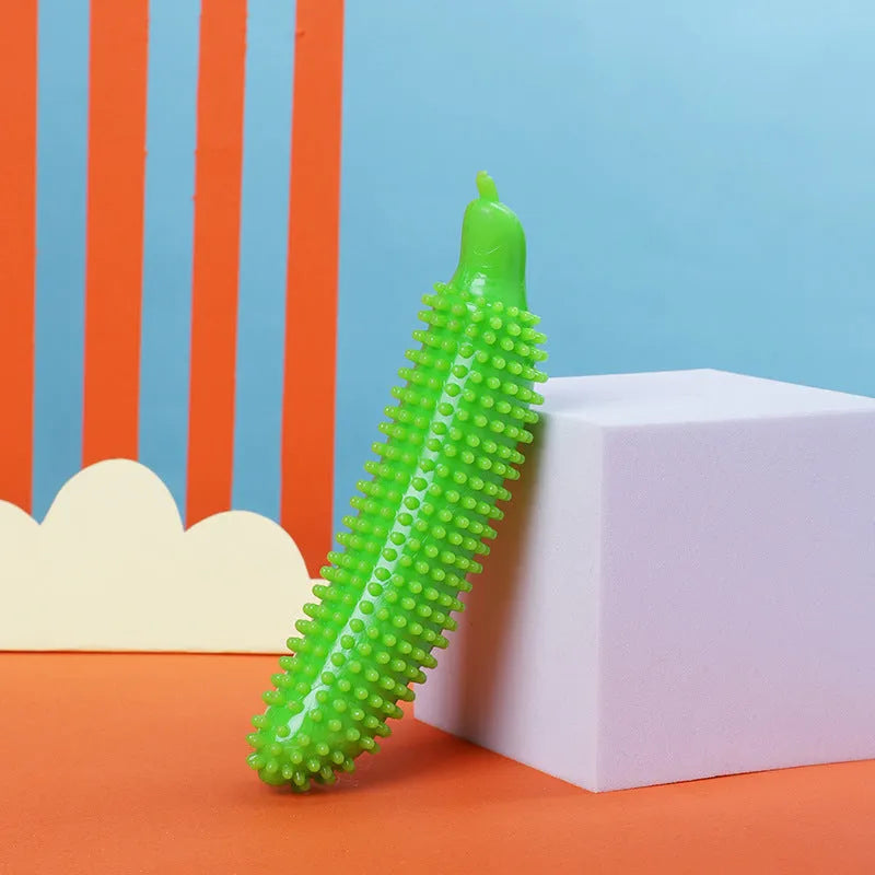 Cucumber-shaped dog chew toy in TPR material for teething relief and interactive training