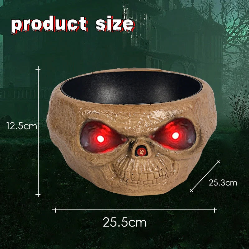Motion-activated Halloween pumpkin candy bowl with spooky skeleton hand and glowing red eyes