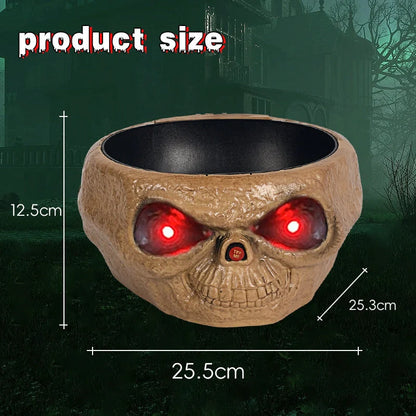 Motion-activated Halloween pumpkin candy bowl with spooky skeleton hand and glowing red eyes