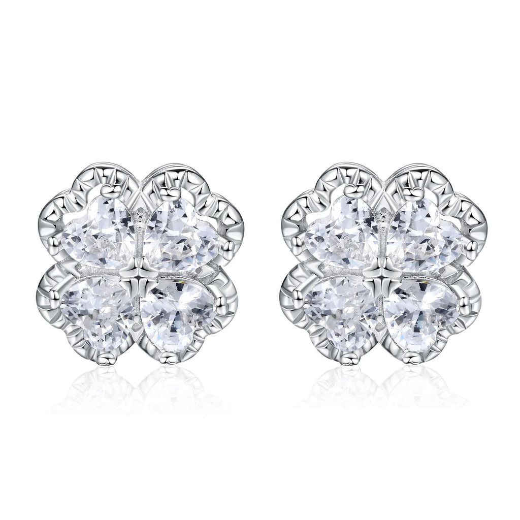 Women's sterling silver heart-shaped earrings with a four-leaf clover design and zircon stones.