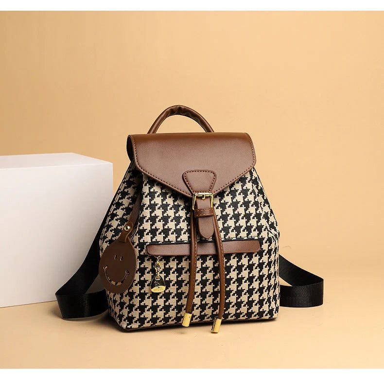 Women's leather backpack in black, black with brown, and ostrich with khaki colors