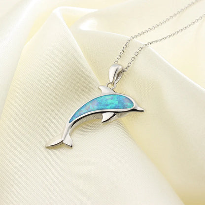 Ocean Dolphin Pendant Copper Necklace with opal detail on a copper chain
