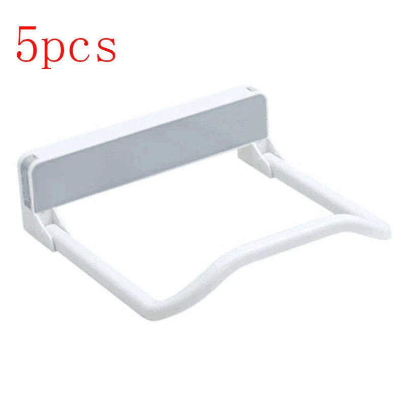 Folding storage rack with non-marking stickers in pink, blue, and grey