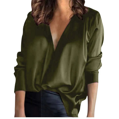 Women's green satin long-sleeved shirt with nine-quarter sleeves on hanger