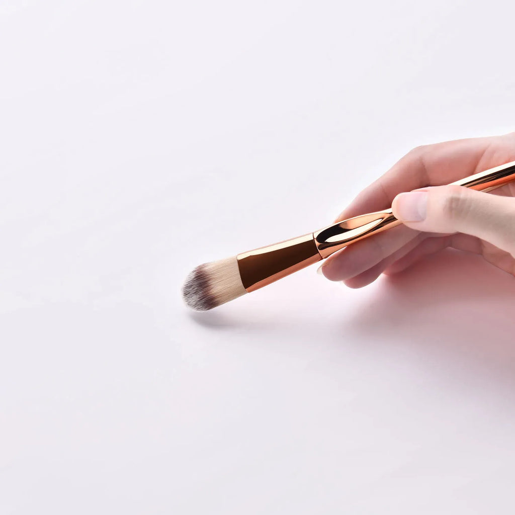 8-piece makeup brush set with nylon bristles, rose gold heart type handles, 22cm long, gold colour