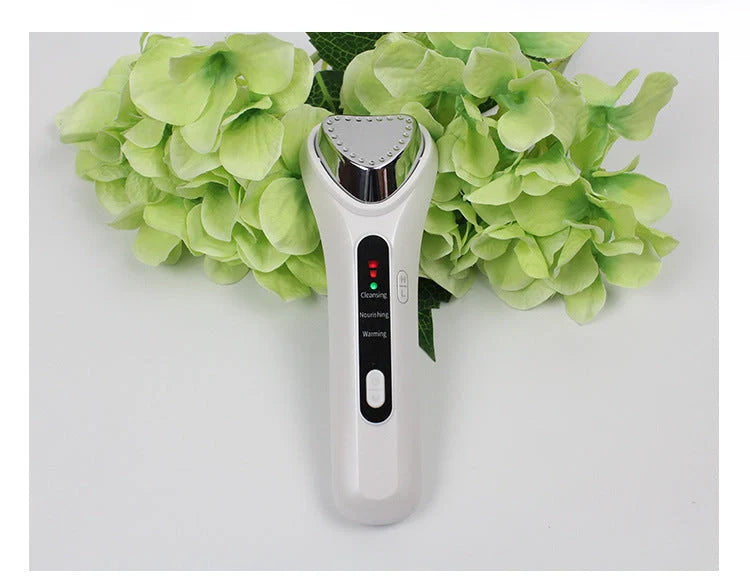 Electric Ultrasonic Facial Beauty Device in white, compact design for skincare