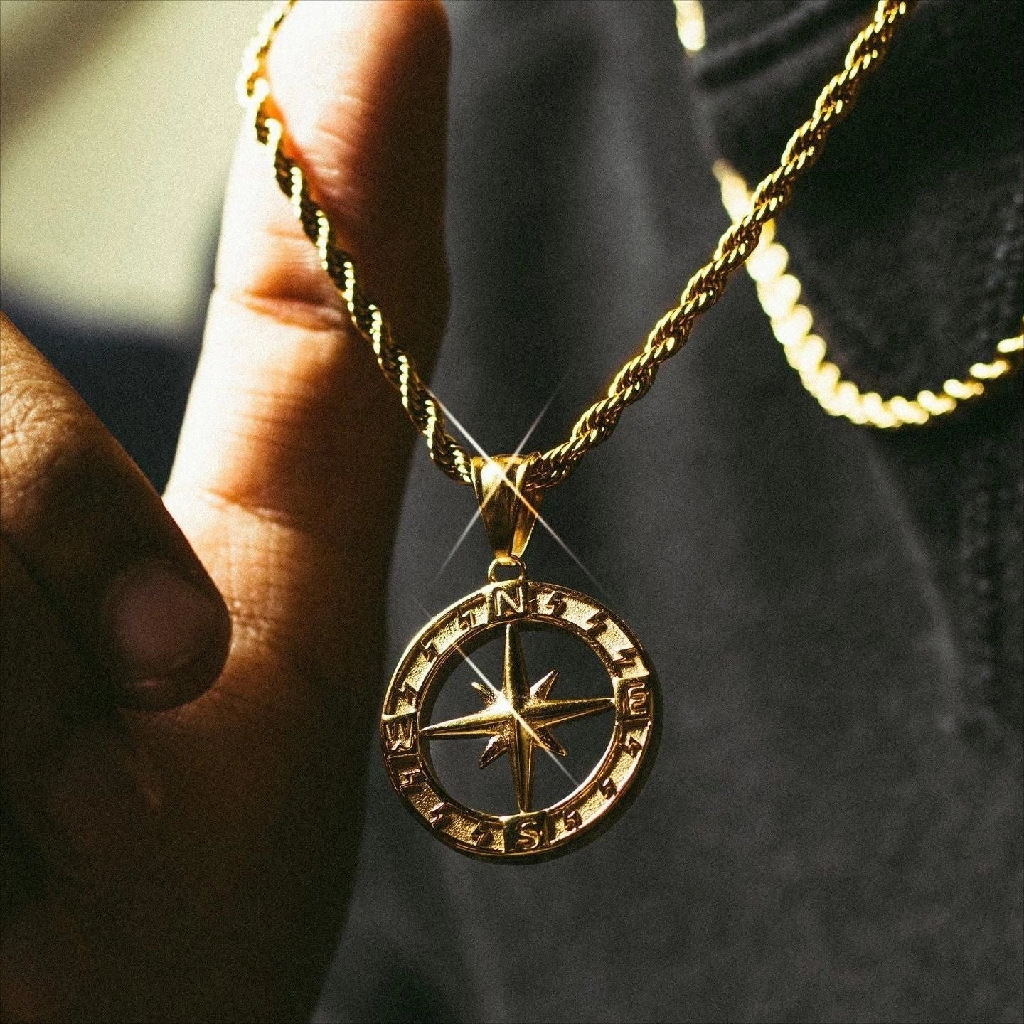 Stainless steel compass circular necklace with electroplated finish in gold and steel options