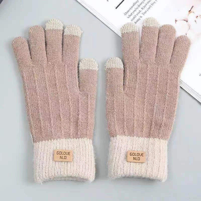 Winter mittens with embroidered stripes in various colours for warmth and style
