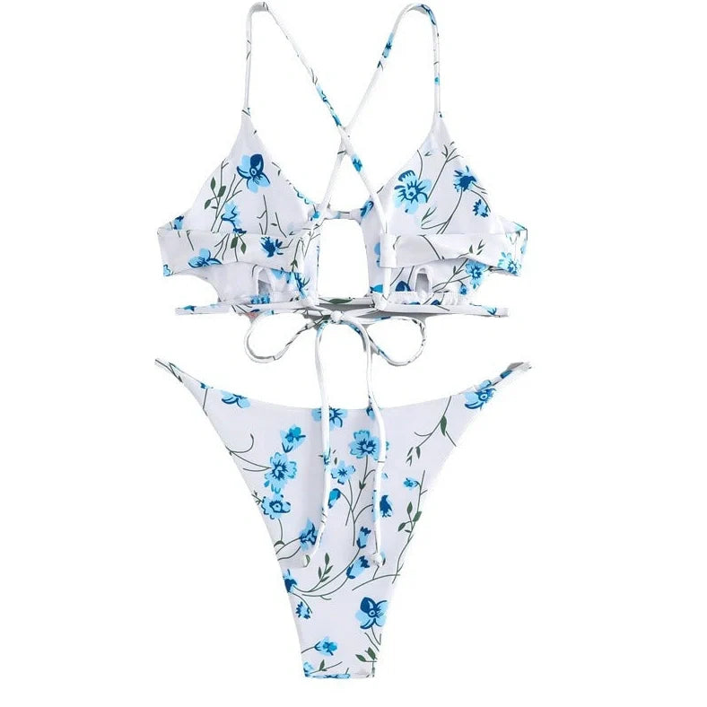 Women's floral pattern tie-neck triangle swimsuit with matching shorts on mannequin