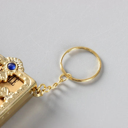 Mini Holy Bible Keychain with Jesus Cross in PVC colour leather, dimensions 4.5x6.0cm