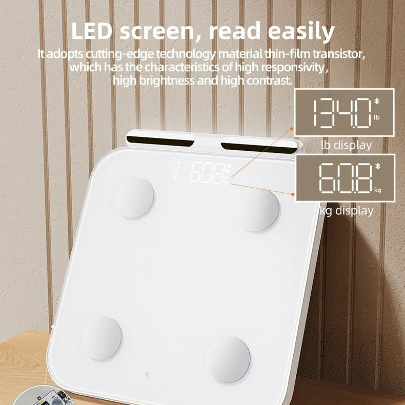 White professional body fat scale with 8 electrodes, tempered glass platform, and LED display.