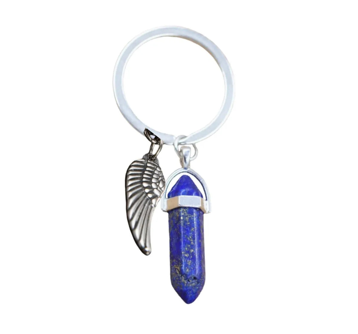 Natural stone bag hanging ornament pendant with metal key ring on a blue background