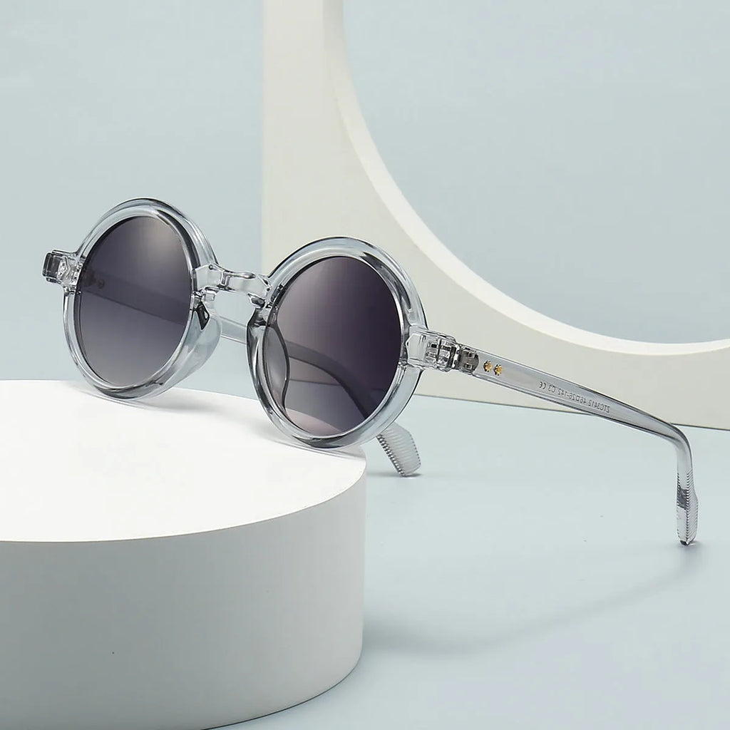 European American retro artistic round sunglasses with black frame and gray lenses, full-frame plastic design
