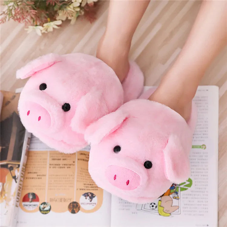 Pink pig-themed floor slippers with short plush exterior.