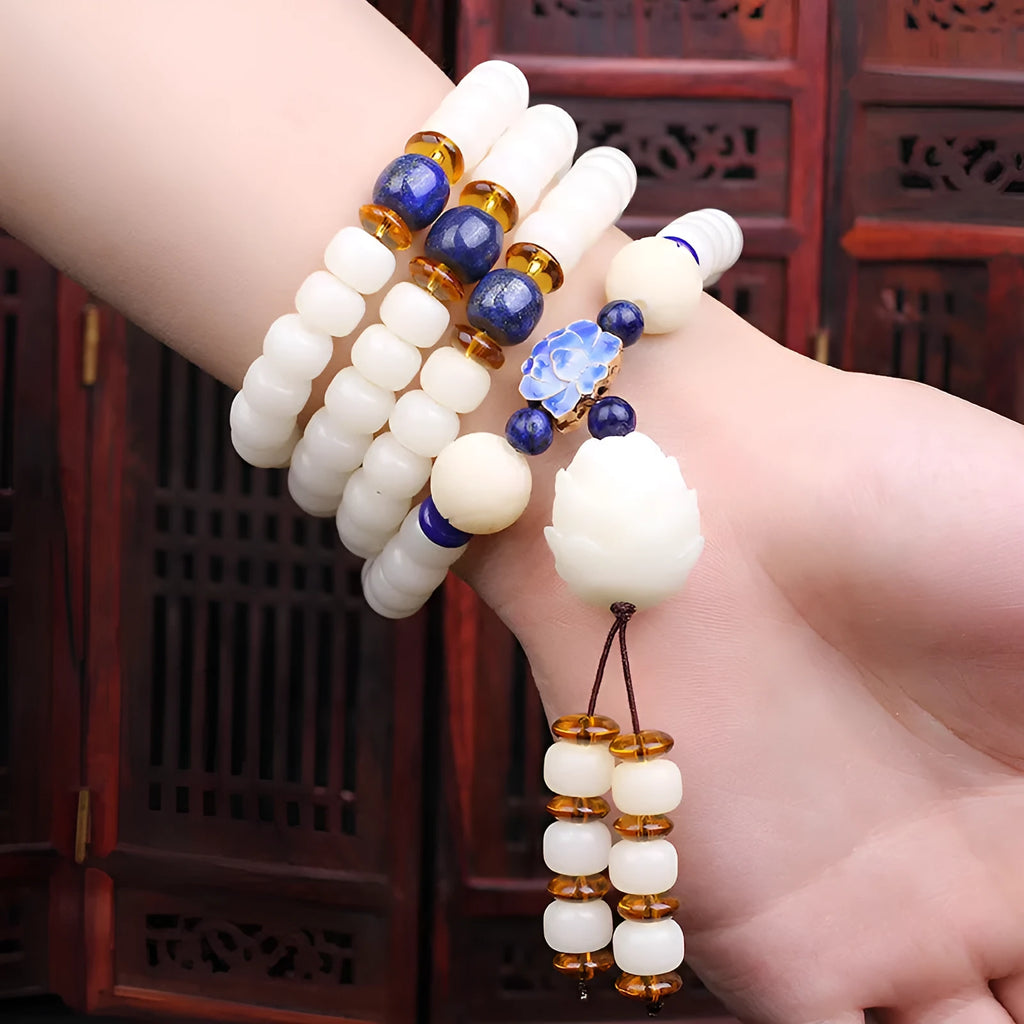 White jade Bodhi bead long bracelet showing detailed beadwork in one of nine available styles.