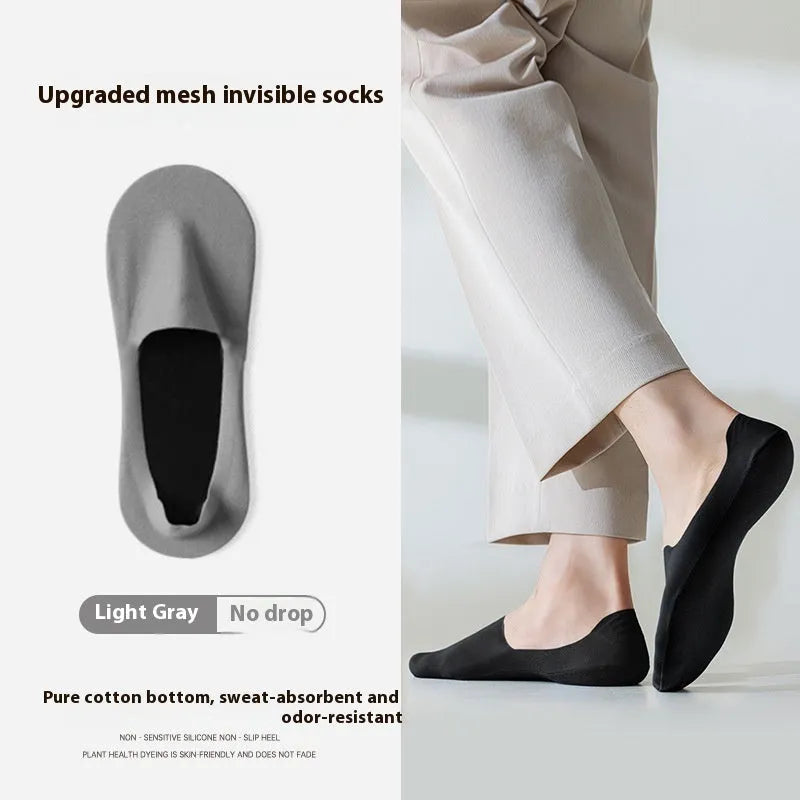 Men's solid colour cotton invisible socks showing non-slip grip on heel