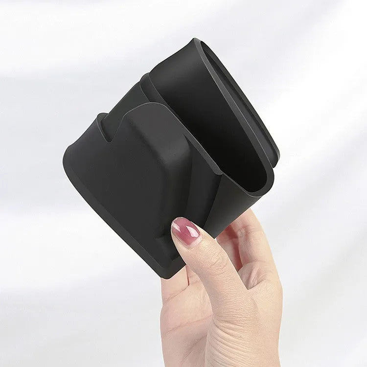Black silicone glasses case mounted in Tesla Model 3/Y centre console