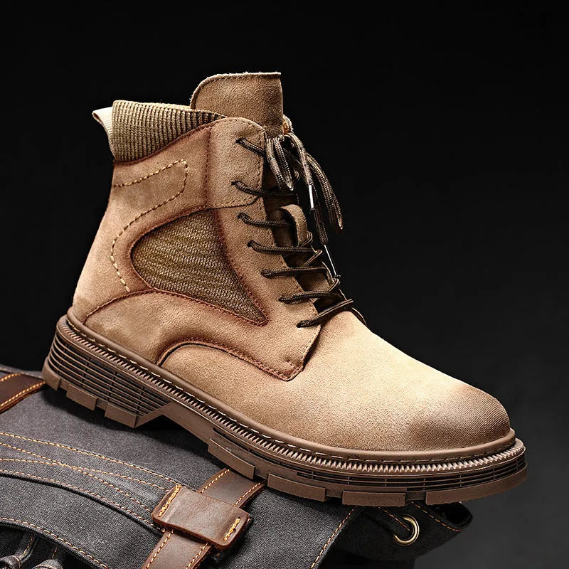Men's frosted brown Martin boot with round toe and thick rubber sole on a grey background.