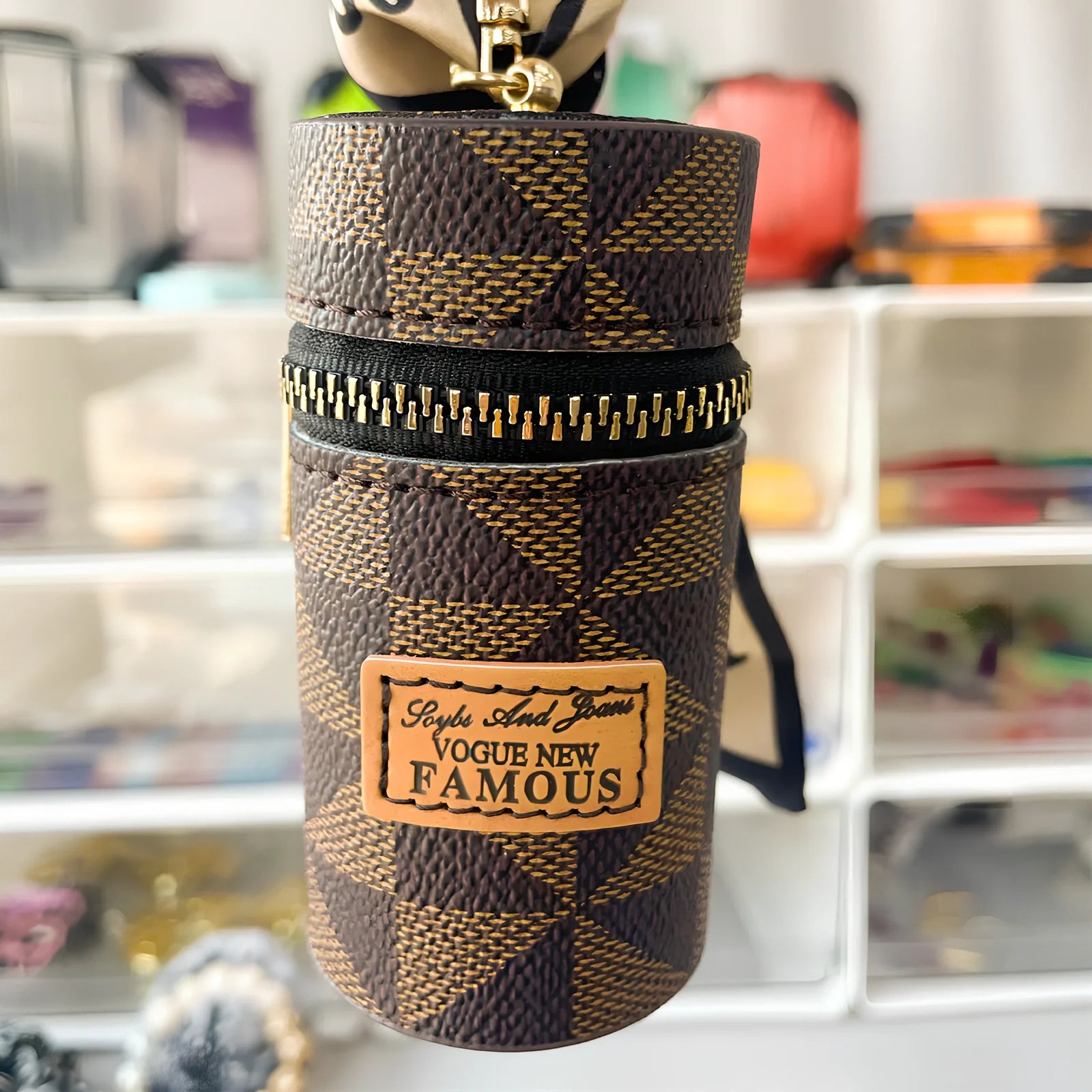 Black self-defence keychain set with alarm, bottle opener, and multiple protection tools