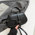 Urban Simplicity PU shoulder bag in horizontal square shape with sewing thread detail, available in black colour