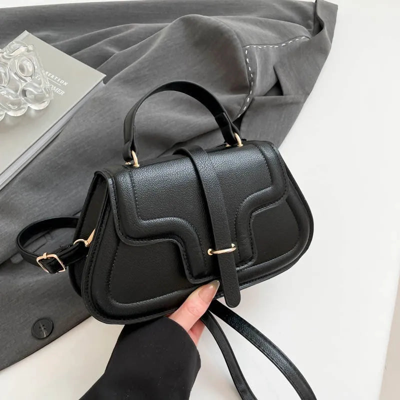 Urban Simplicity PU shoulder bag in horizontal square shape with sewing thread detail, available in black colour