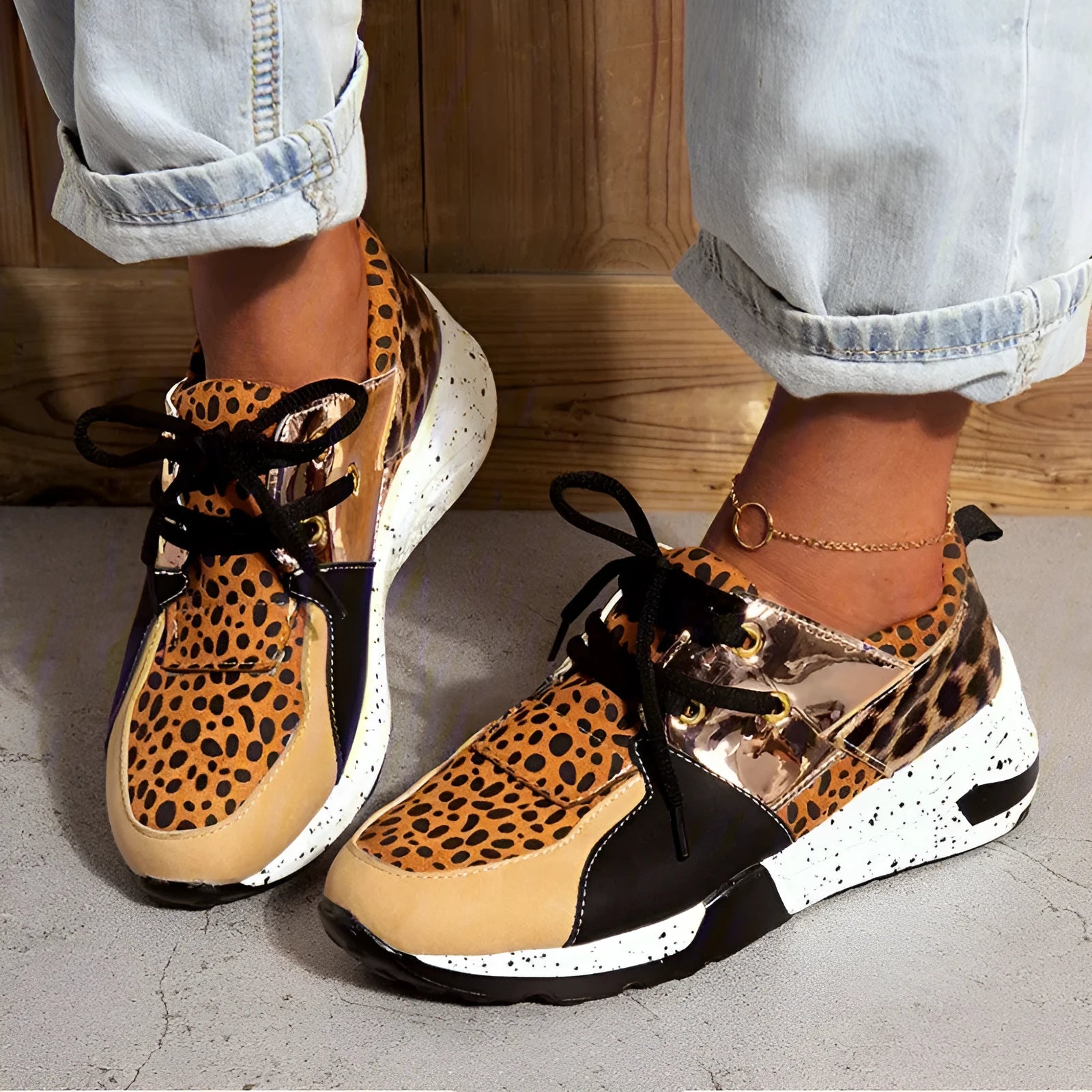 Women's suede sneakers with a wedge heel in various colours on a white background.